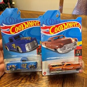 Blue and Orange Toy Car Duo